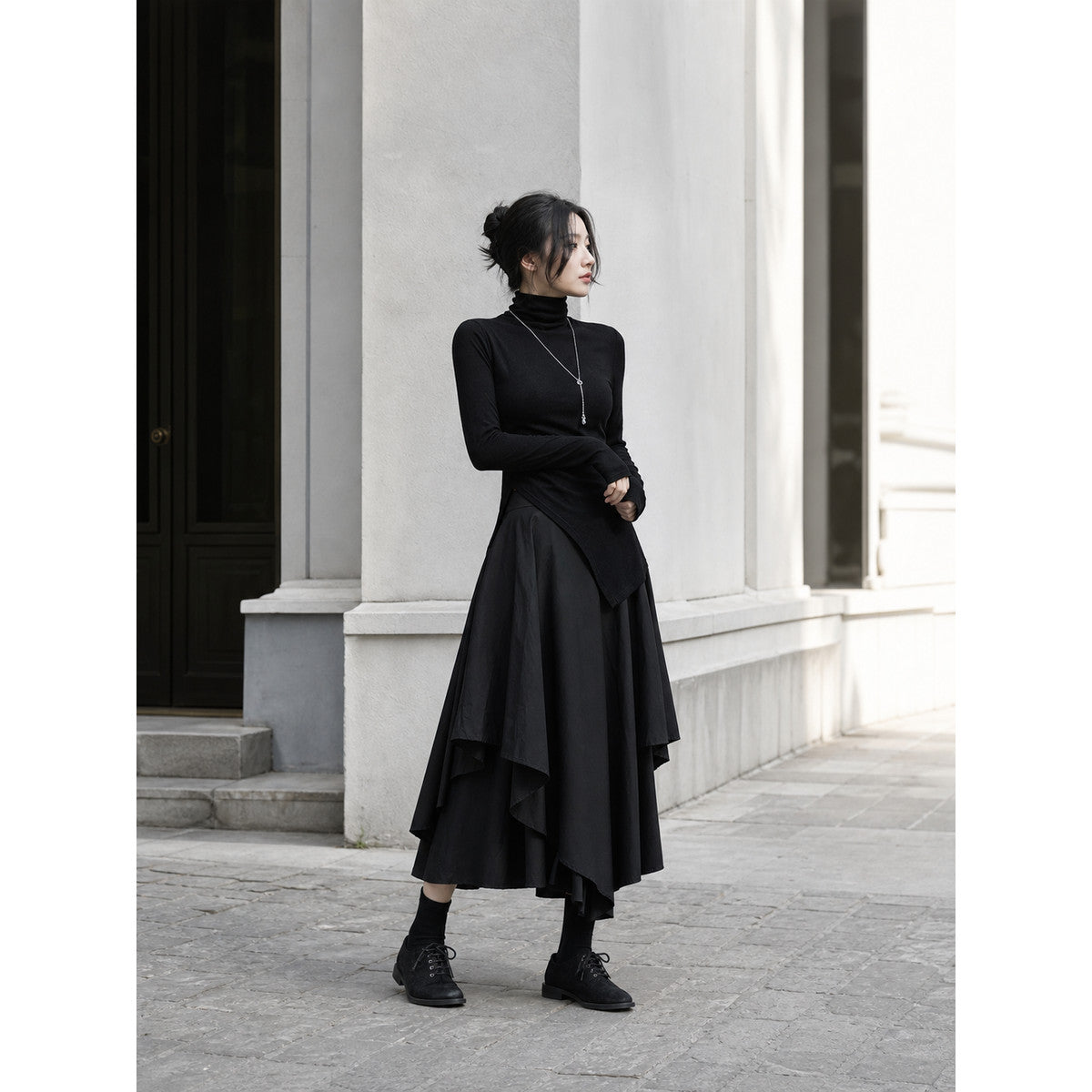 Women's Black Long Skirt with an Asymmetrical Hem