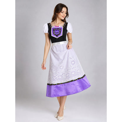 The dress is designed in an ethnic style and features a contrasting combination of white, pink, purple, and black. It has a black bodice, voluminous white puff sleeves, and a white waistband. The front is decorated with a purple lace-up det