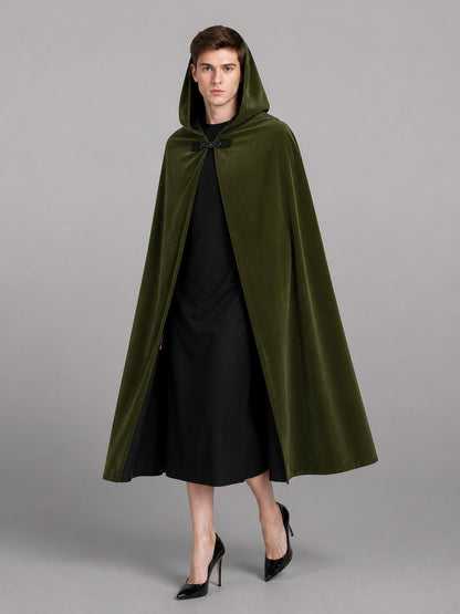 Green hooded cape with black lining, shown full-length on a model wearing the oversized hood up