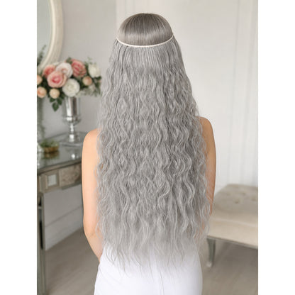 Back view of a model wearing the gray wavy beard accessory, with long strands extending down the back