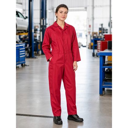 Woman wearing the red coverall jumpsuit in a garage, showing the unisex fit