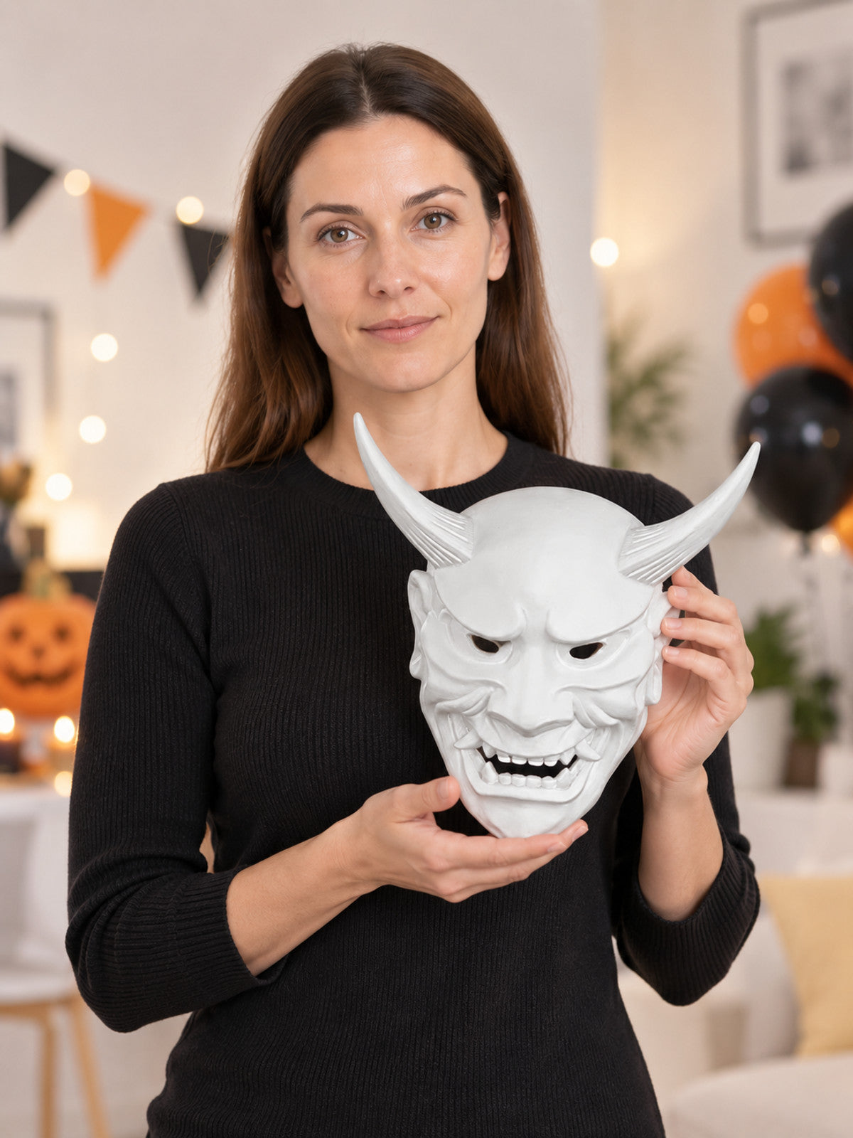 White demonic mask with horns and fangs