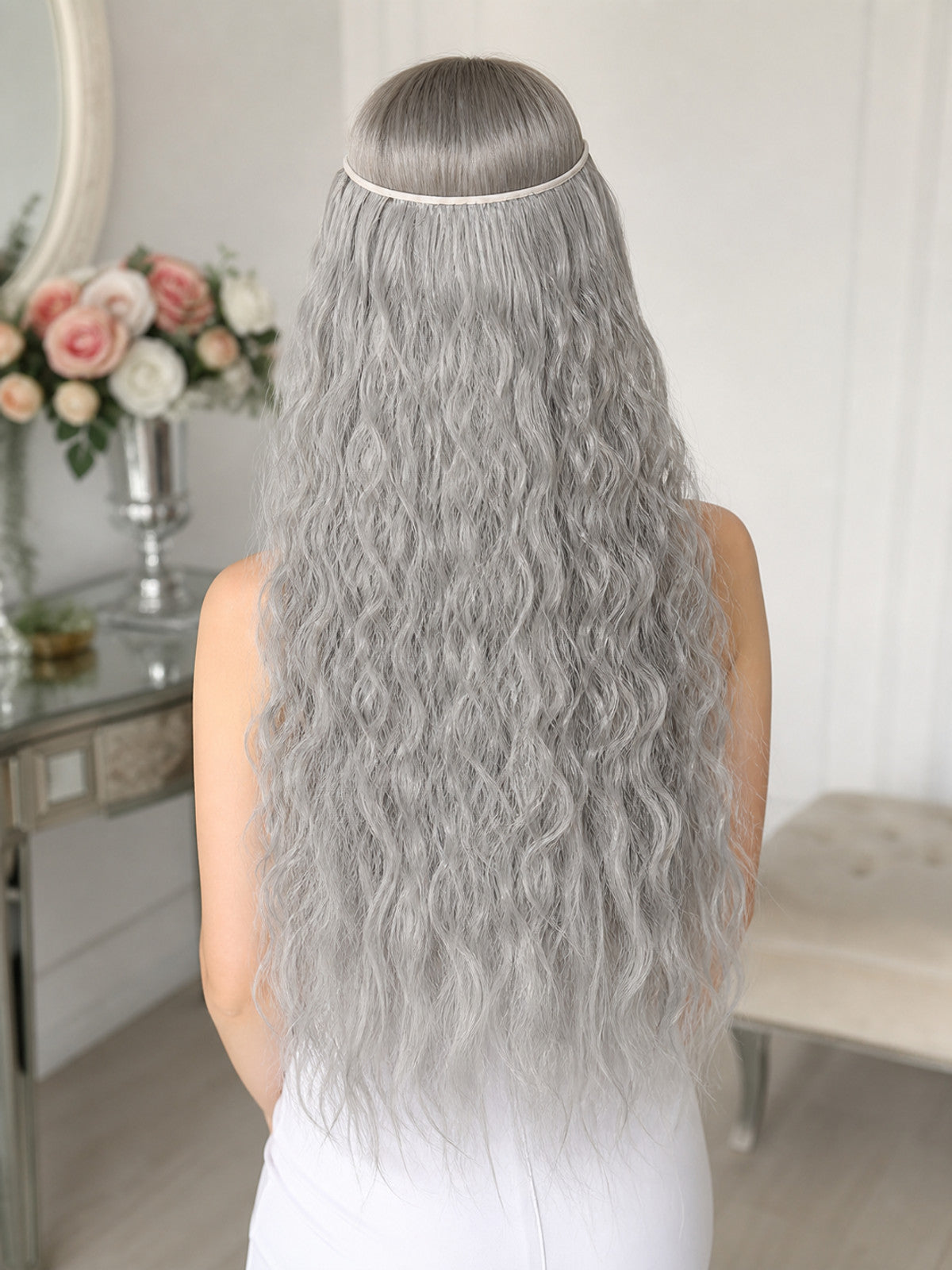 Gray wavy beard accessory shown from the back on a model, with long textured strands and a thin headband