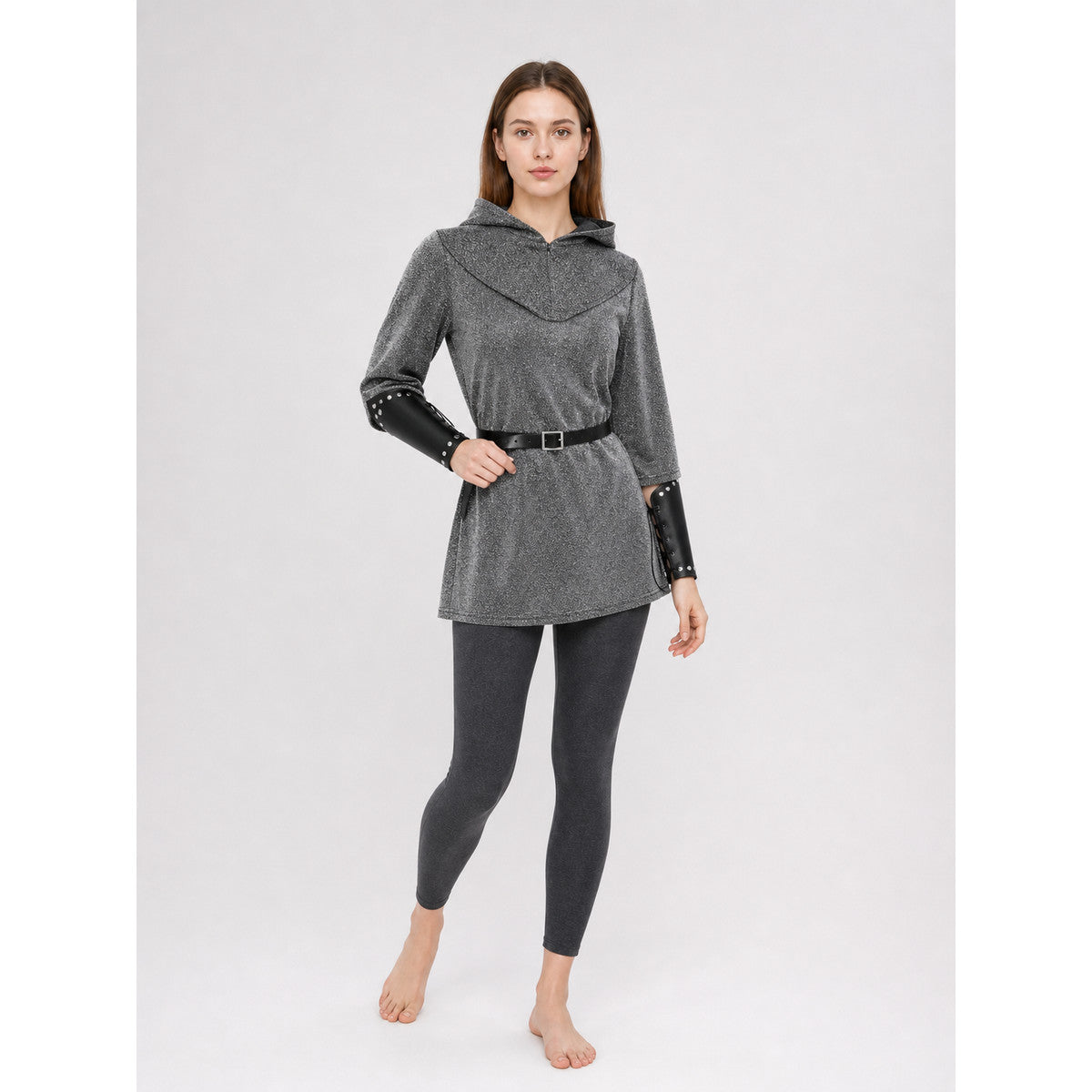 The set is designed in a medieval style and is suitable for creating a cosplay or stage-performance look. It includes a gray long top with a hood, a headpiece in the form of a gray hood, black bracers, and a black belt with a square buckle 