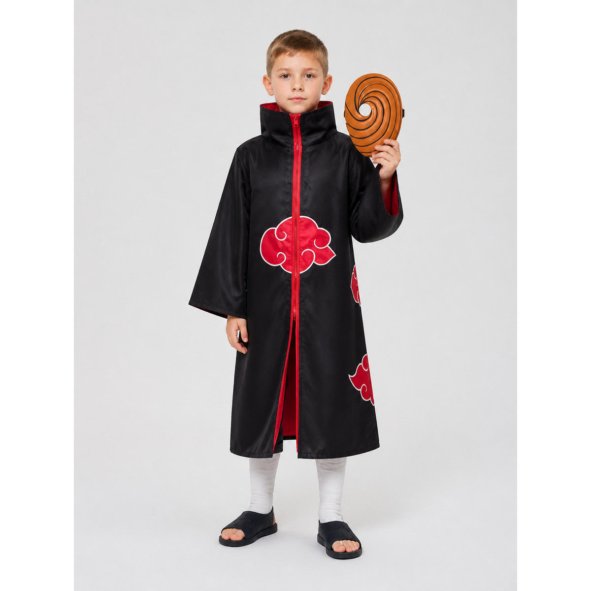 Black Akatsuki cloak with red-lined high zip collar shown on a child model holding the orange spiral mask