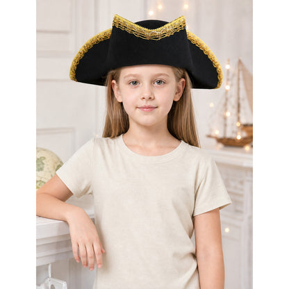 Black pirate hat with gold trim shown front-facing on a child model in a styled indoor scene