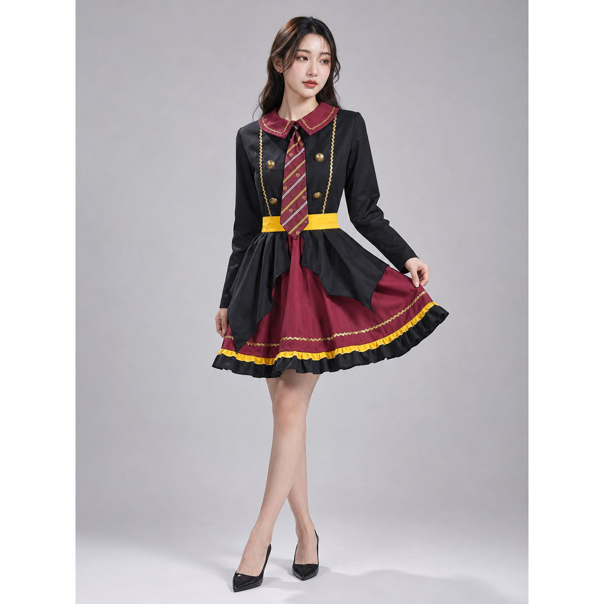 The costume dress features a combination of black, burgundy, gold, and yellow colors. The design has a black long sleeve and a burgundy notched collar attached to the dress bodice. The front is decorated with a diagonal striped panel, while