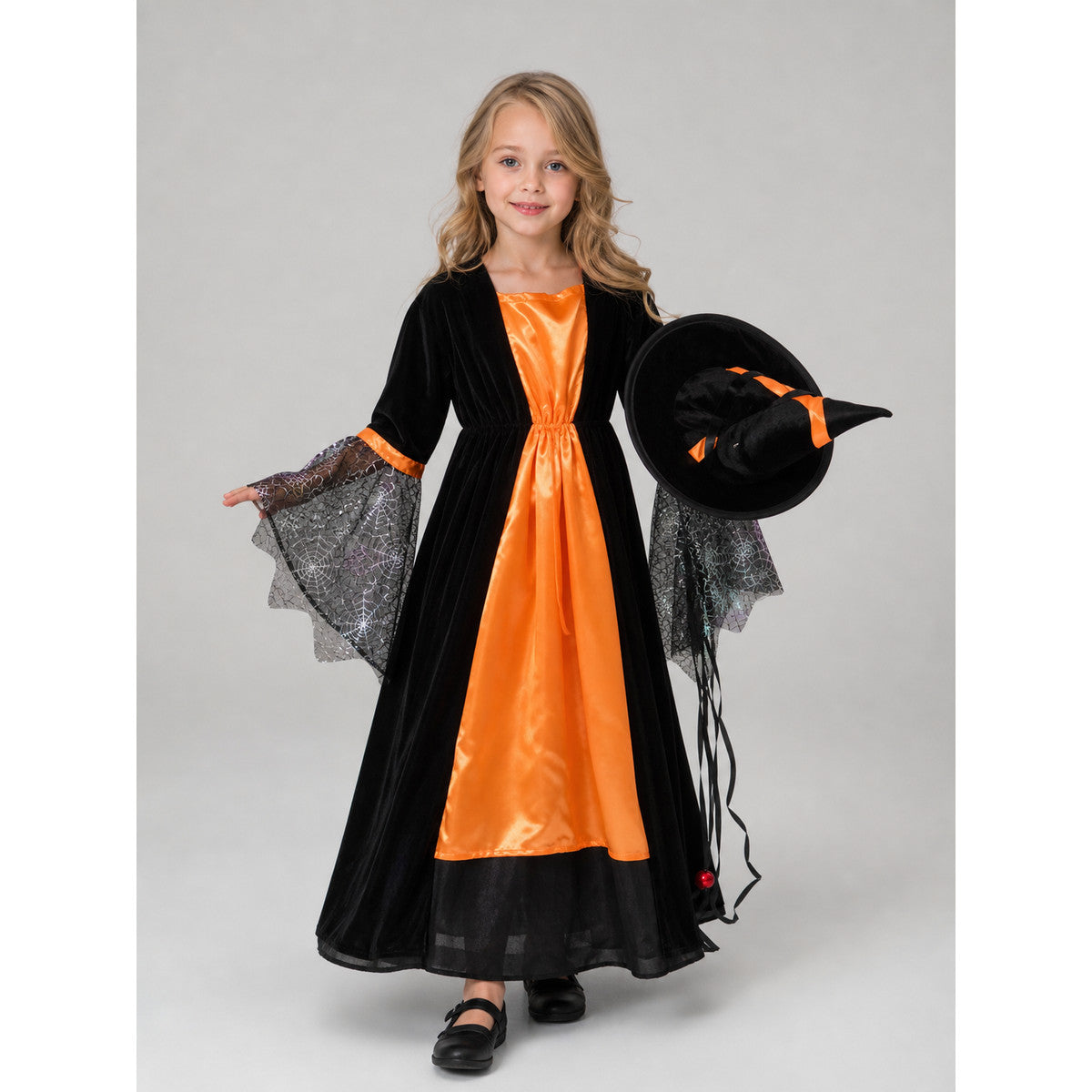 Witch-style costume set featuring a long black dress with long sleeves, a wide flared bottom, and a black pointed hat. The design uses orange, silver, and black colors. The center front of the dress features an orange decorative element, an
