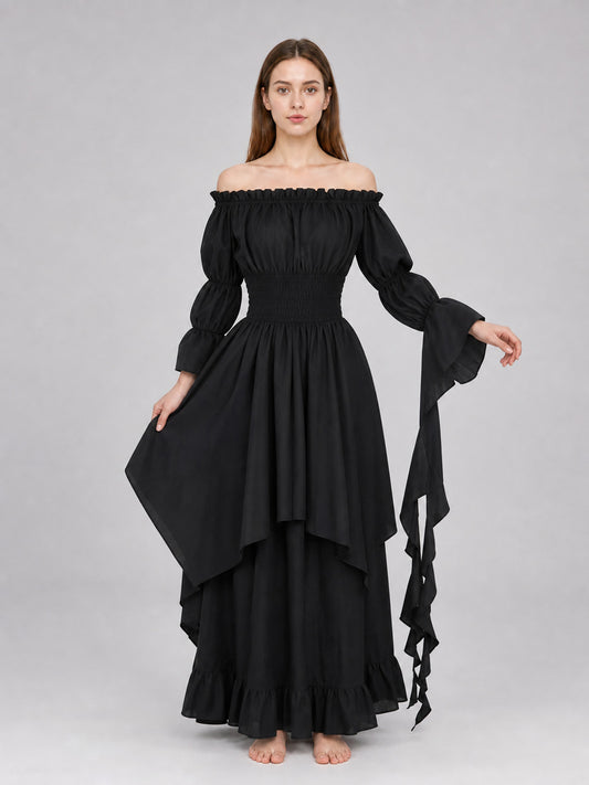 Full-body model wearing a black off-shoulder maxi dress with gathered sleeves, layered ruffled skirt, and long ribbon-like sleeve ties