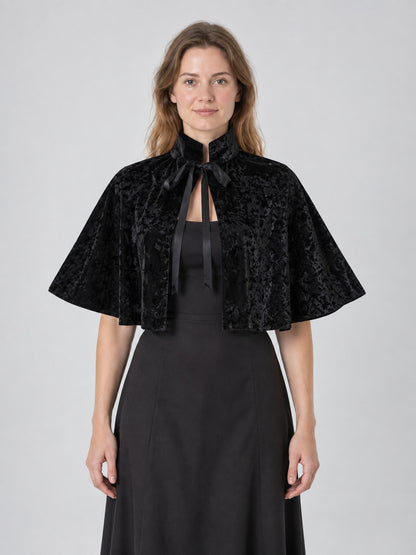 Black velvet cape with high collar and ties