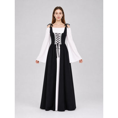 The dress is designed in a vintage medieval style and features characteristic elements of Renaissance-era clothing. The main part of the design is black, while the white details create a striking contrast. The fitted black bodice features a