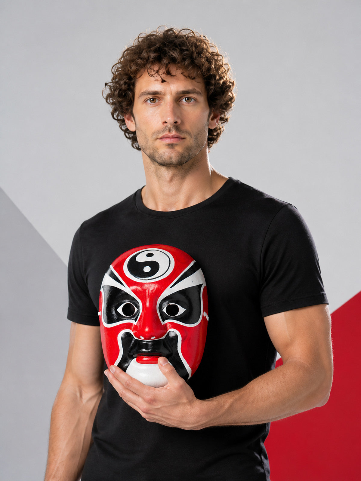 Carnival mask with a red, black, and white face for Halloween