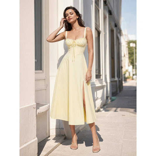 Yellow midi dress with a slit and thin straps