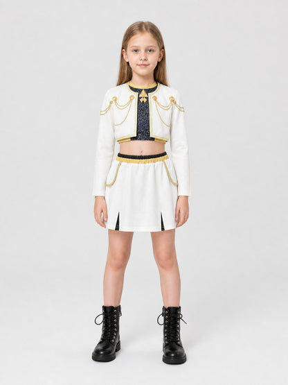 Children’s stage costume, white, black, and gold, 3 pieces on-model view
