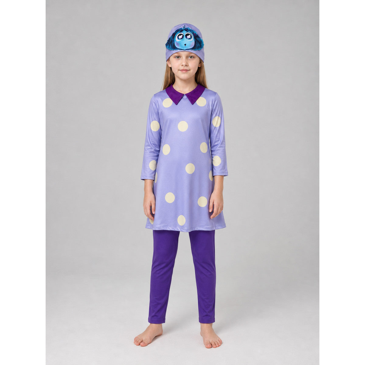 A bright costume set in the style of the character from Inside Out 2 is designed for a themed look and an eye-catching transformation. The set includes a long-sleeve tunic dress, matching leggings, and a headpiece with the character’s face 