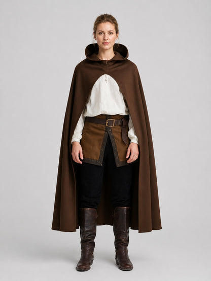 Brown hooded cape shown full-body on a model, with a smooth matte finish and front clasp over a white blouse