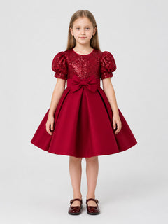 Party Dress with Sequins, a Full Skirt, and a Bow