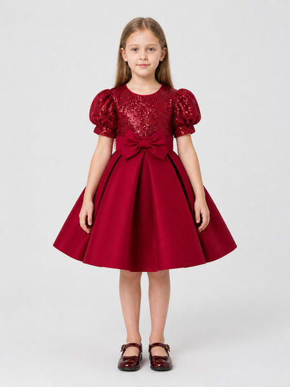 Party Dress with Sequins, a Full Skirt, and a Bow on-model view