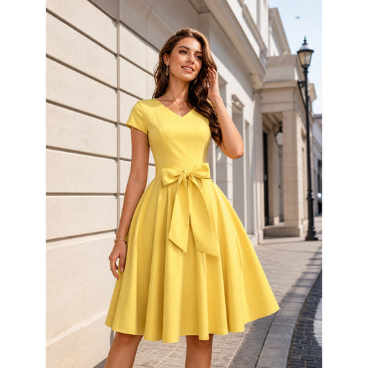 Yellow Dress with a V-Neck, Short Sleeves, and a Bow