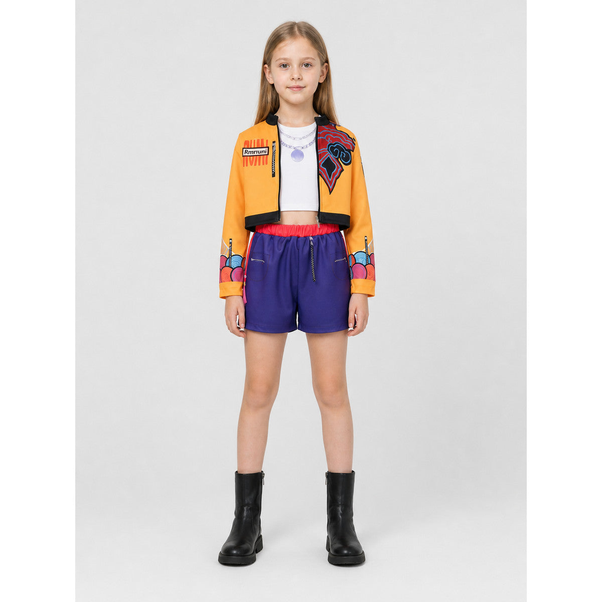 Children's set with an orange jacket and purple shorts