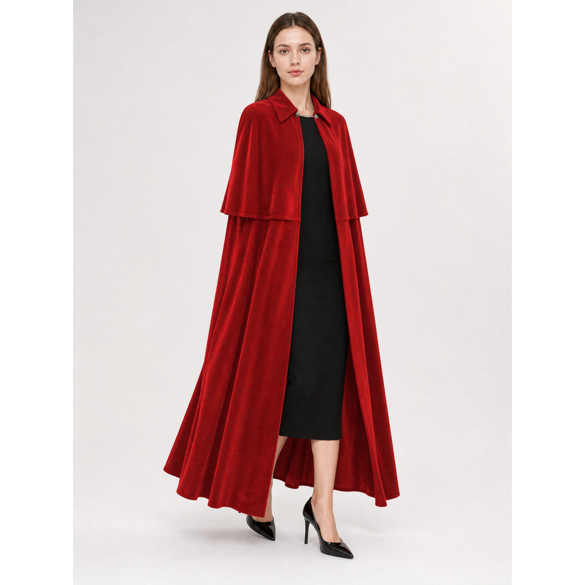 Model wearing the long dark red velvet vampire cape with turn-down collar and shoulder capelet, front view