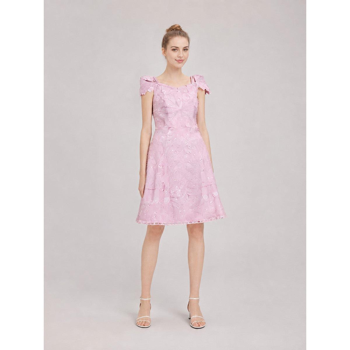 Pink cosplay dress inspired by the film “Wicked 2.” The design features a on-model view