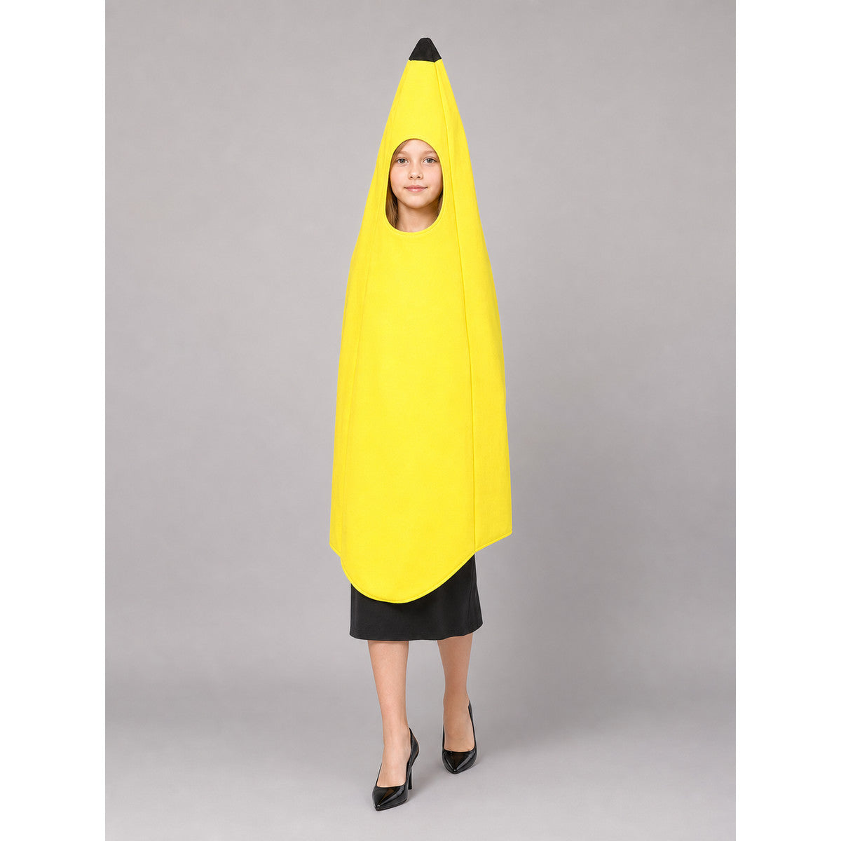 Bright banana-shaped costume for dress-up and fun events. The design is a tall, elongated banana: the main color is rich yellow, and the top is finished with a black pointed tip. There is a face opening in the upper area, and the open secti