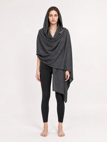 Model wearing the charcoal gray hooded scarf wrap with hood up and long draped front, front view