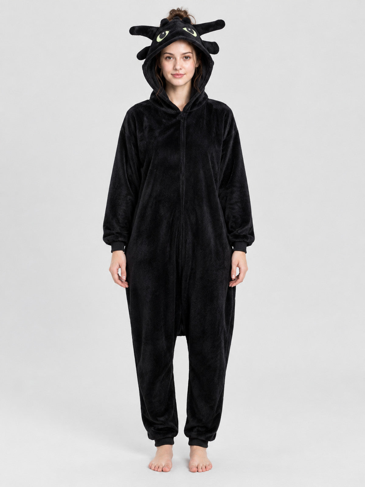 Black and white pajama jumpsuit with a hood and ears