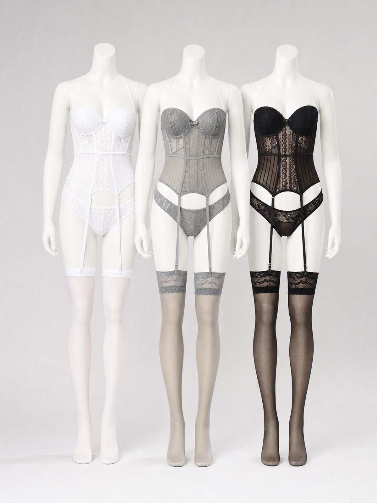 Lace bodysuit with garters, bust, and bow front view