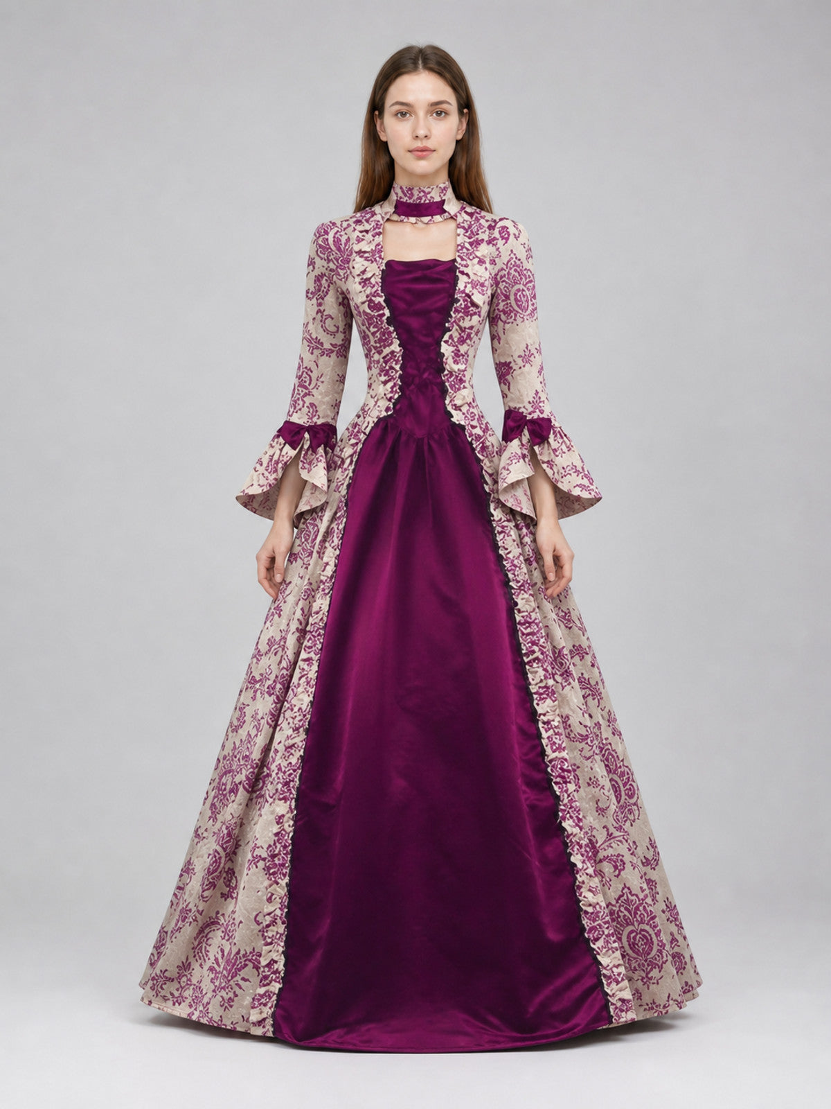Dressy dress with a patterned design and flared sleeves front view