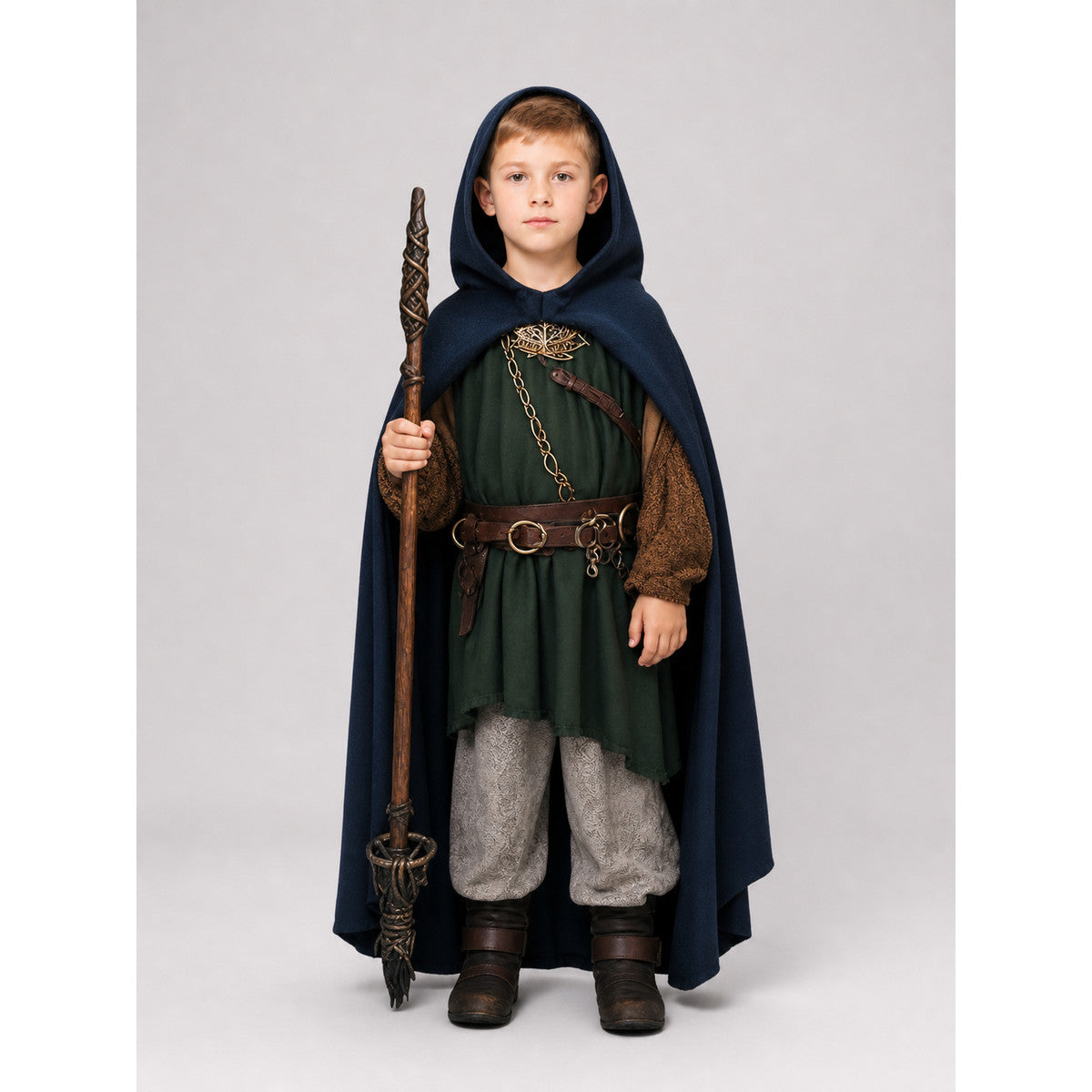 Dark blue hooded cloak shown full-body on a child with the hood up, worn over a green costume and held with a staff