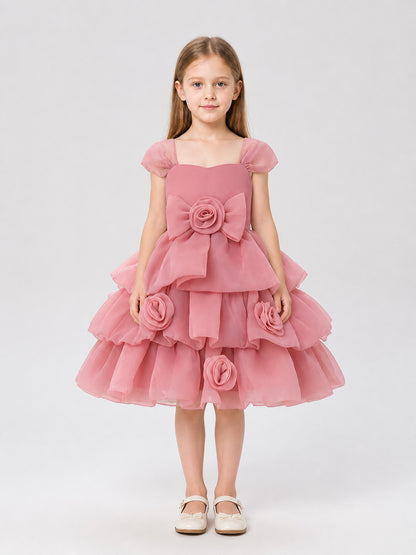 Full-skirt dress with roses for a flower girl at a wedding on-model view