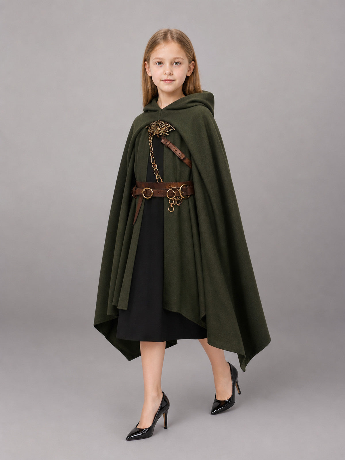 Green hooded cloak in soft matte fabric, shown full-body on a child model with a brown belt, decorative clasp, and chain