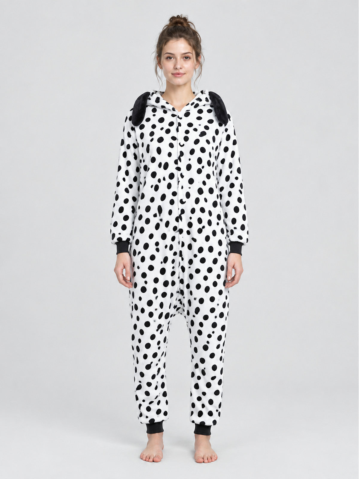 White pajama jumpsuit with black spots and ears