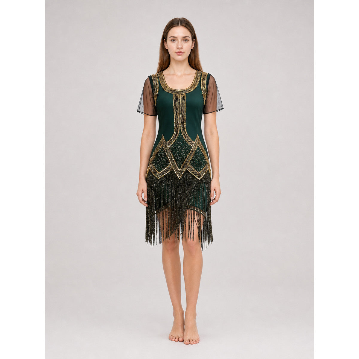 This fringed dress is designed in a vintage cocktail style, combining dark green front view