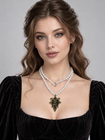 Two-Strand White Beaded Necklace with Bronze Cross