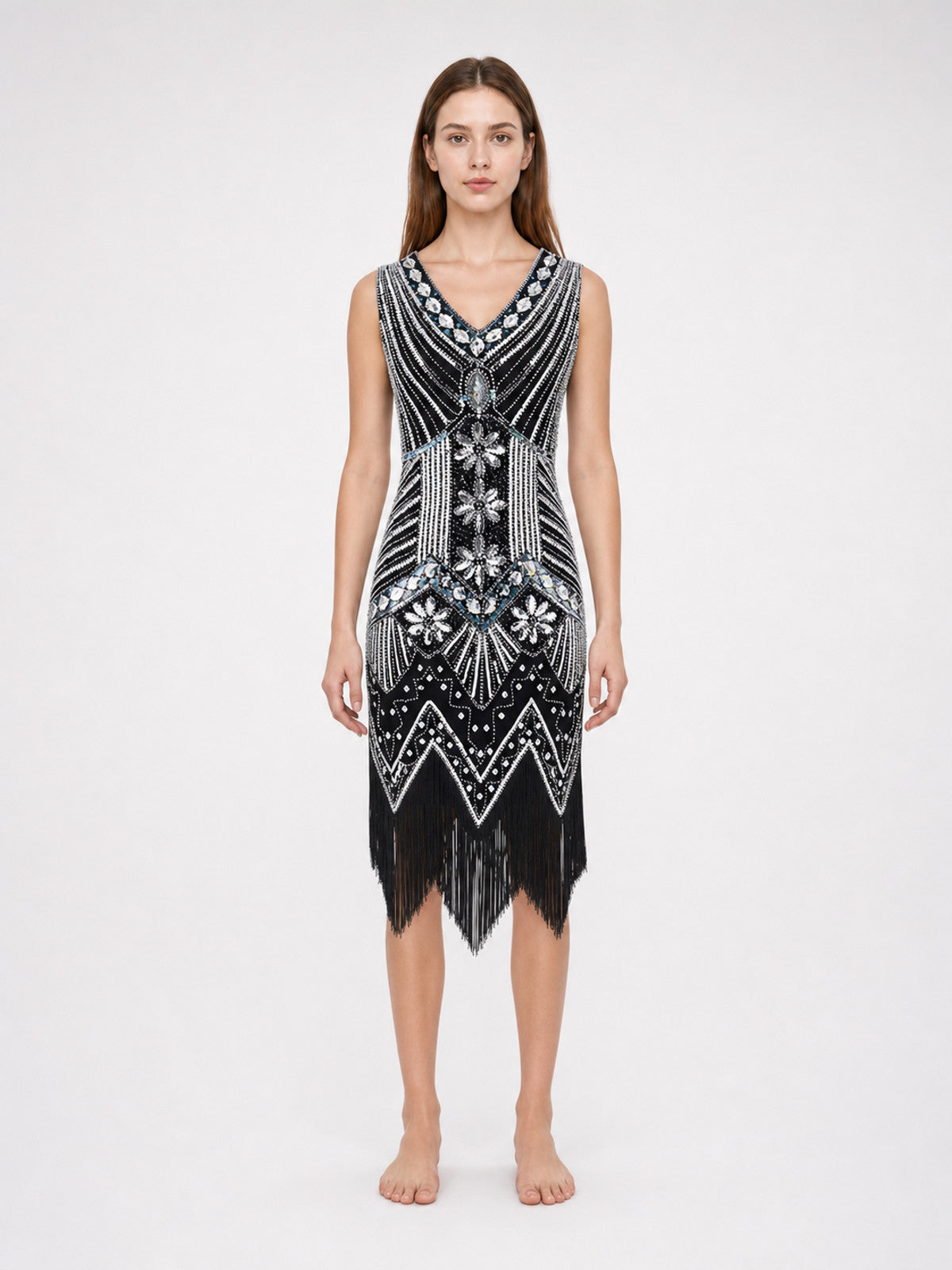 Sleeveless dress with a V-neckline and a fitted silhouette, made from fabric front view