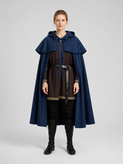 Navy blue hooded cape with layered shoulder capelet, shown full-body on a model over a dark costume outfit