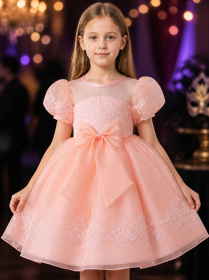 Girls' Pink Princess Dress with Lace Trim, Large Bow, and Puff Sleeves on-model view