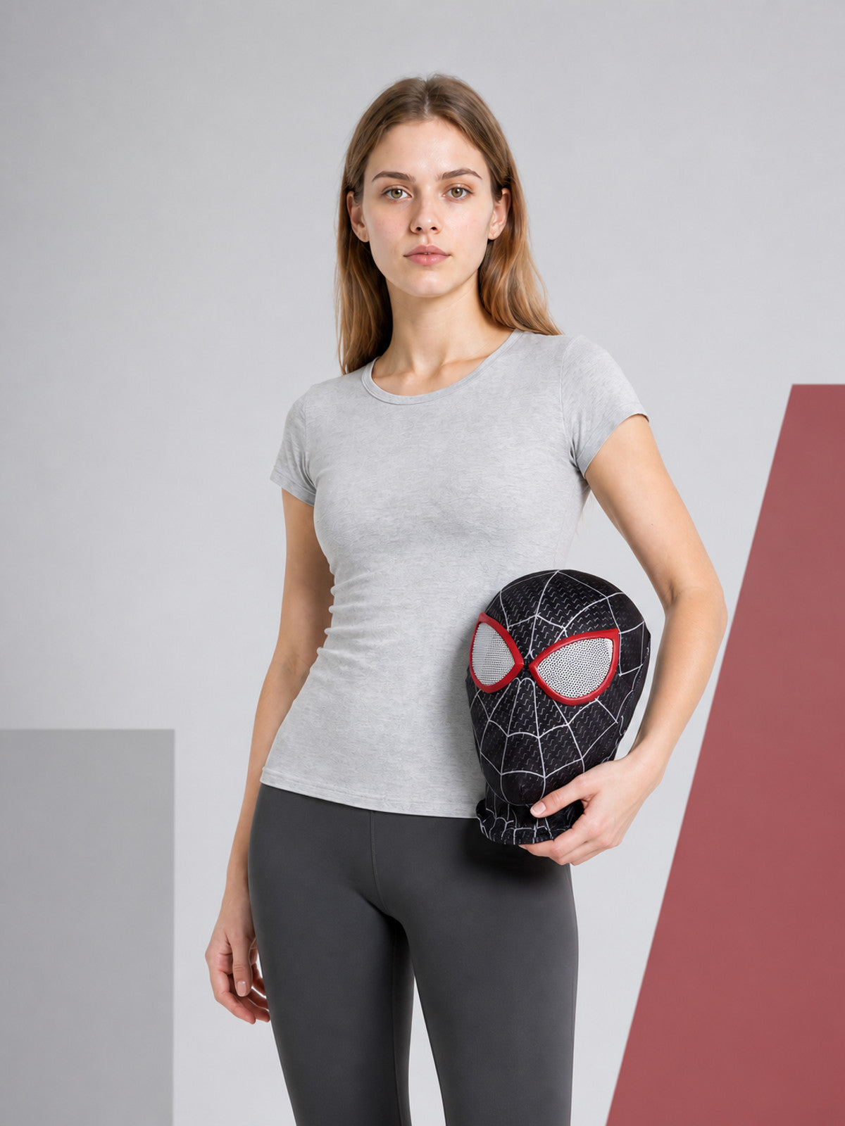 Black carnival mask with a red-and-white pattern