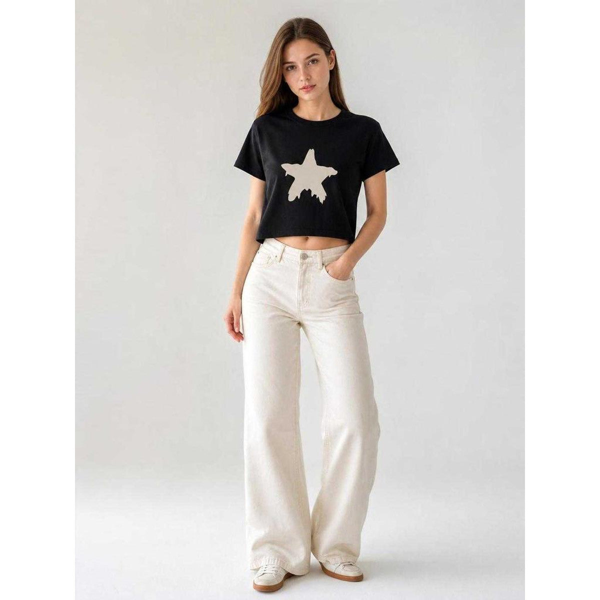 Black T-shirt with star print for an outfit on-model view