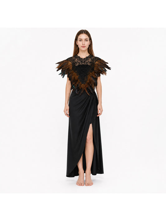 Black lace feather cape with brown and black layered feathers, shown on a full-body model over a long black dress