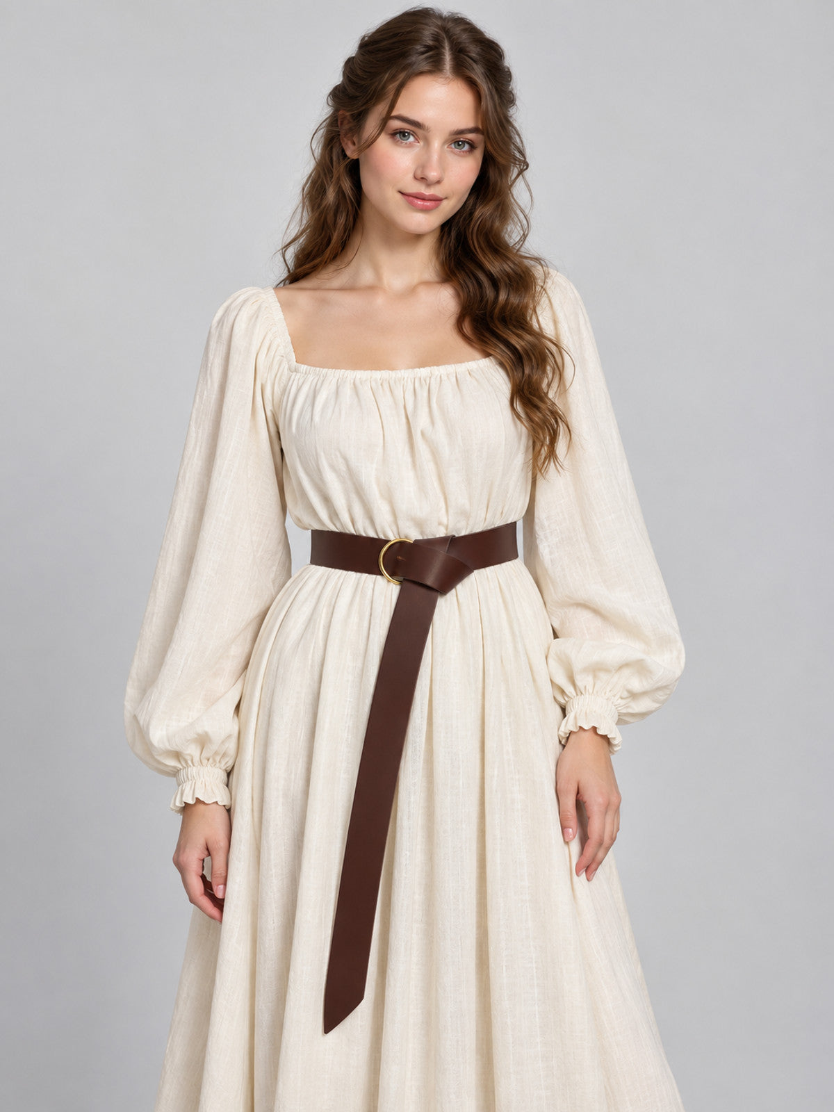 Long brown belt with metal ring