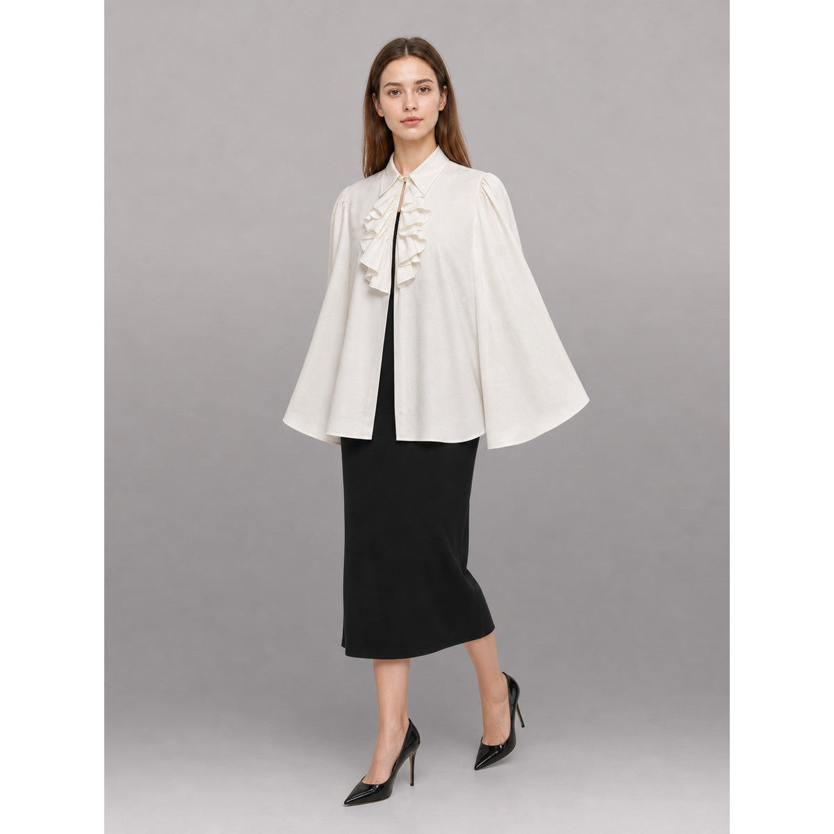 White blouse with a high collar and ruffles front view