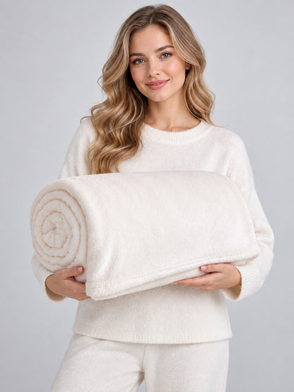 Solid light cream blanket with a fleece surface