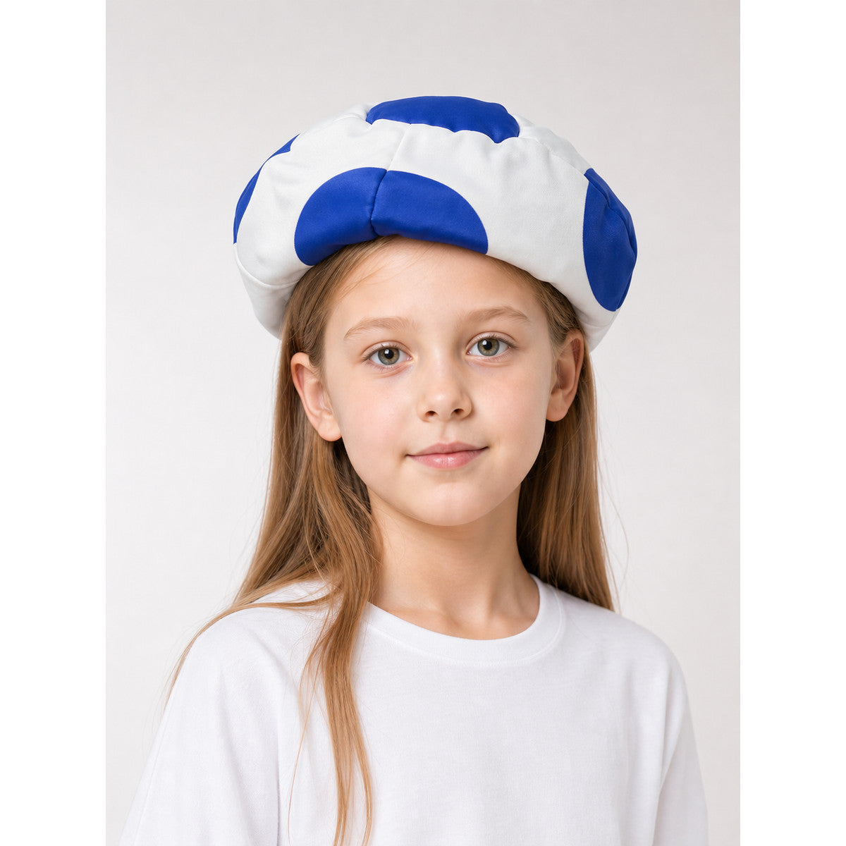 Round Blue and White Pillow with a Soccer Ball Design