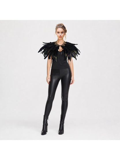 Feather capelet, black with layered shoulder feathers and a gold-trimmed collar, shown on a full-body model against a white background