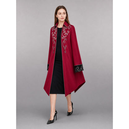 Burgundy tailcoat with embroidery and black panels front view