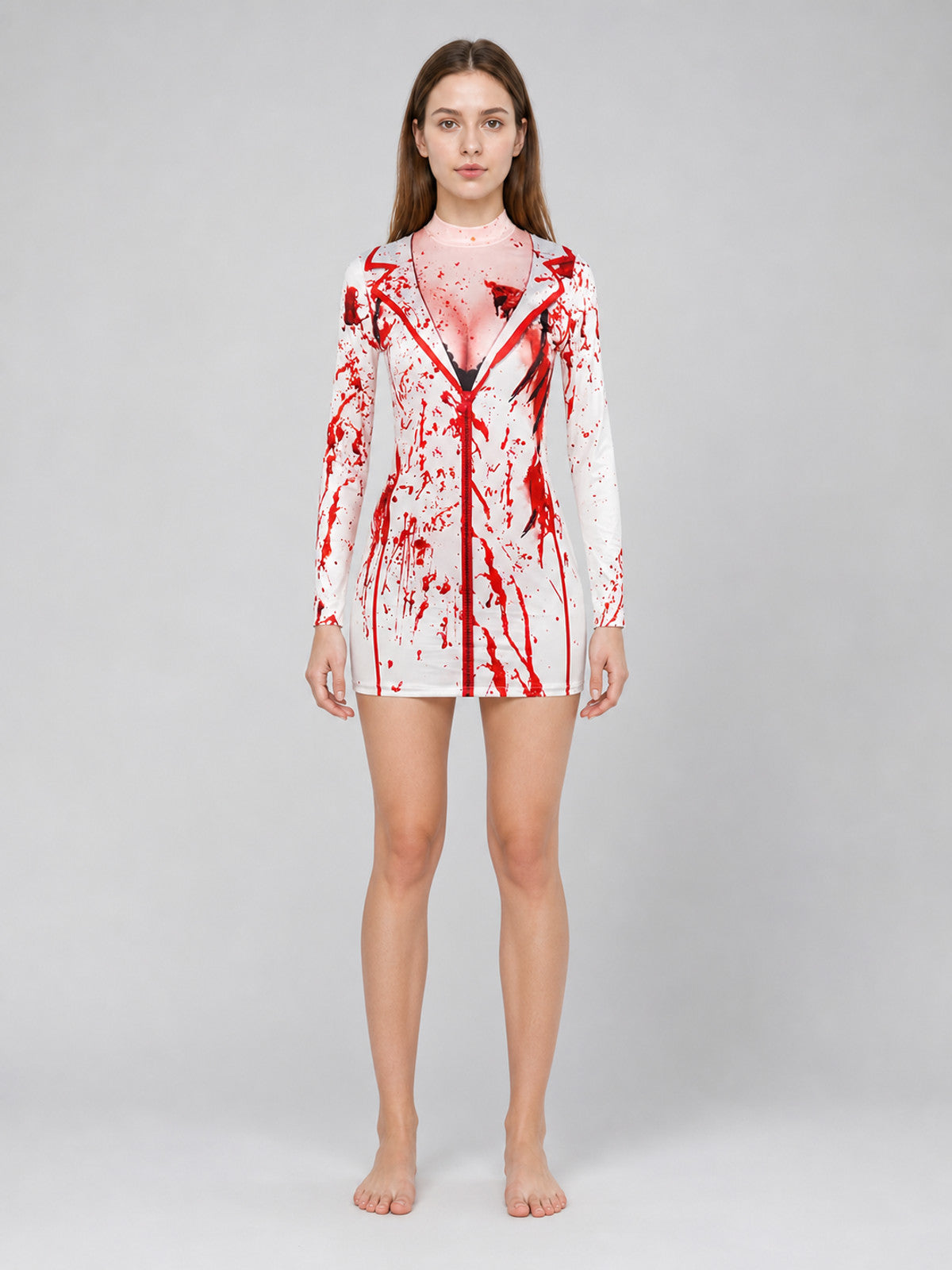 White long-sleeve costume top with red splatter print and dark trim, shown full-body on a model from the front